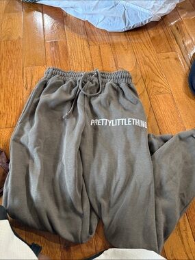 PrettyLittleThing Olive Green Joggers with White Logo